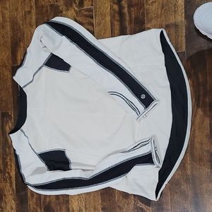 Lululemon women's cream and black sweatshirt. Black overlay stitching Sz Medium.